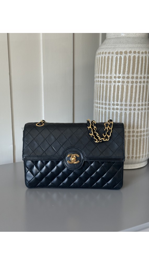 Chanel Classic Quilted Double Flap Bag i Sort Lammeskinn